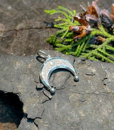 This exquisite Enamel Lunar Amulet, known as Lunnitsa or Lunula, is a symbol of ancient protection and feminine power. Crafted from high-quality silver and featuring delicate enamel detailing, this moon-shaped talisman is believed to bring good fortune, fertility, and protection to its wearer. Historically worn by women in Slavic and Baltic cultures, the Lunula pendant is a timeless piece of lunar-inspired jewelry, perfect for those seeking a deeper connection with the moon's mystic energy. Idea Protection Jewelry, Necklace Moon, Feminine Power, Pendant For Women, Inspired Jewelry, Fertility, Timeless Pieces, Pendant Necklaces, Favorite Jewelry