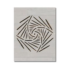 a white tile with an abstract design on it