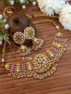 Gold Plated Very Beautiful Traditional Designer Sabyasachi inspired Pachi Kundan Bridal Choker with Beautiful Heavy Jhumki  This product is handmade & hence the product can be non-uniform & vary in color & texture. If u are looking like a Princesses in your Wedding then go with this Grand Necklace   Fashion Empire gives you new look, Made of high quality material(s).  This is very Designer Necklace Set, Its A Choice Of Many Bollywood Celebrities.  Trust me, it is more Beautiful in Real another the Picture  This beautiful Set which is light in weight. The stones used are of high quality and the alloy used is led free. Designed By Master Craftsmen. Based On Indian beautiful Jewelry with a touch of the a contemporary art. Earrings Post Back Wire Is Very Thin, Soft And Properly Located In Cent Festive Bollywood Jhumkas, Designer Stone Work Jhumkas For Festive Occasions, Bollywood Style Chandbalis With Tilla For Designer Wear, Traditional Chandbali Jhumkas For Designer Wear, Traditional Anarkali Set With Stone Work For Designer Wear, Traditional Meenakari Jhumkas For Designer Wear, Traditional Jhumkas For Designer Festivals, Designer Tilla Chandbalis For Diwali, Designer Jhumkas With Latkans For Diwali