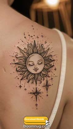 a woman's shoulder with a sun tattoo on the chest and stars around it