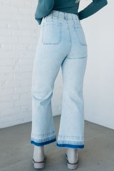 These Twila Raw Edge Crop Jeans are made with mineral washed denim, creating a unique, lived-in look. Featuring a straight leg style and a raw bottom hem, these jeans give off a relaxed, casual vibe. The button and zipper closure, along with the belt loops, ensure a secure and comfortable fit. Complete with two open front pockets and two back pockets, these jeans offer practicality and style in one. 68% Cotton 30% Polyester 2% Spandex High Rise Light Mineral Wash Wide leg SIZE GUIDE & MEASUREMEN Crop Jeans, Washed Denim, Raw Edge, Denim Wash, Cropped Jeans, Front Open, Size Guide, Comfort Fit, Straight Leg