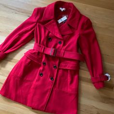 Nwt Brand New - Didn’t Fit Me This Red Wool-Blend Trench Coat Features Polished Hardware And Subtle Seamed Detailing Includes: Notch Collar Double-Breasted Button Closure Front Flap Pockets Belt Loops Adjustable Belt At Waist - Ribbed Design 100% Polyester Lining All Measurements Are Approx Bust 20.5" Waist 20" Shoulder Length 23" Shoulder Width. 17" Jacket Length. 36" Red Spring Outerwear For Office, Red Spring Outerwear For The Office, Red Double-breasted Spring Outerwear, Red Outerwear For Fall Workwear, Red Outerwear With Pockets For Office, Red Outerwear For Work In Fall, Red Office Outerwear With Pockets, Tailored Red Outerwear With Pockets, Tailored Red Outerwear For Fall