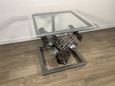 I make any kind of furniture you can think of an incorporate engine parts as a functional piece. This particular table features the internals from a Chevy v6. The top is 24x24 and it's about 27 inches tall. This would make a great end table or night stand, any where you would like. I also make custom pieces so message me with any questions. I can ship as required. Engine Block Table Coffee Tables, V8 Engine Coffee Table, Engine Coffee Table, Engine Table, 409 Chevy Engine, Chevy 235 Engine, Coffee And End Tables, Living Furniture, End Tables