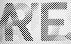 an abstract black and white background with the letters e, f, and v in diagonal stripes