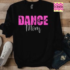 Glitter Dance Mom long sleeve T-SHIRT  Can be customized with Dancer and name on back.   Please select the colors for design - two colors only, the colors are in the chart.   A mock-up will be sent prior to printing if requesting personalization.    💓Sizing 💓 This is a UNISEX shirt.  We have included a size chart, so please check prior to ordering.  💓 ALL OF OUR ITEMS ARE HANDMADE  💓 We take pride in every item we make. This means that once you place your order we get your shirt from our sup Long Sleeve Graphic Print Tops For Dance, Long Sleeve Tops With Letter Print For Dance Class, Graphic Print Long Sleeve Tops For Dance, Long Sleeve Letter Print Top For Dance Class, Long Sleeve Graphic Print Top For Dance Class, Long Sleeve Tops With Custom Print For Cheerleading, Fitted Long Sleeve T-shirt For Dance, Long Sleeve T-shirt With Letter Print For Dance, Dance Mom Shirt Ideas