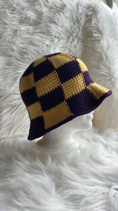 It's summertime and that means time for a nice cool bucket hat! This really fun checked bucket hat is done in a purple and yellow coloration - University of Washington Huskies colors. A very striking hat made with 100% cotton yarn that will ensure your comfort in the warm weather and protect your head from the suns hot rays. Plaid Bucket Hat For The Beach, Yellow Cotton Bucket Hat With Short Brim, Purple One Size Bucket Hat With Curved Brim, Purple Bucket Hat With Curved Brim, Yellow Brimmed Cotton Bucket Hat, Handmade Casual Purple Hat, Casual Handmade Yellow Bucket Hat, Yellow Cotton Brimmed Bucket Hat, Casual Handmade Purple Hat