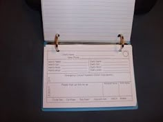 a binder attached to a clipboard with some notes on it that are not in use