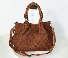 "Cognac Woven Leather Bag, Soft Woven Handbag, Leather Tote Woman, Handmade Shoulder Bag, Large Tote Bag, Modern Leather Crossbody Bag, Elza, comes in dimensions below W 13\" x H 10\" x D 6\". Handle drop: 4\" This bag has made by our italian partner and customizable by our team. We offer one free monogram or name personalization. Please check fonts, color thread, tag samples and leave your monogram or name to embroider. Features: Inside: The bag closes with magnetic snap Two compartments inside Cognac Bag With Braided Handles For Everyday, Cognac Bags With Braided Handles For Daily Use, Daily Use Cognac Bag With Braided Handles, Cognac Shopping Bag With Braided Handles, Cognac Shoulder Bag With Braided Handles, Cognac Tote Shoulder Bag With Braided Handles, Cognac Bag With Braided Double Handles, Cognac Tote Bag With Braided Handles, Leather Tote Bag Women