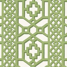 an intricate design in green and white