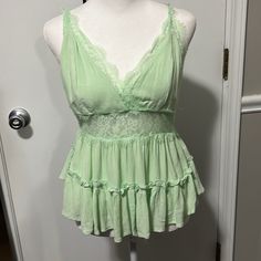 Woven Forever 21 Cami That Crosses In Back Nwt Size S Color Is Pistachio Or A Mint Green Teal Clothes Aesthetic, Sleeveless Light Green Summer Tops, Trendy Light Green Spring Top, Trendy Light Green Spring Tops, Trendy Light Green Tops For Spring, Green Tank Top For Spring, Green Tank Top For Spring Day Out, Green Cami Top For Spring, Forever 21 Green Tops For Spring