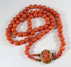 -Antique Victorian 14k Gold Natural Orange Coral Beaded Necklace with Cameo Clasp -Total length: 24 in -Bead size:about 8.35 mm x 7.25 mm -Coral on clasp 14.6 mm x 10.6 mm -Total weight: 49.5 g -Tested 14k Carnelian Earrings, Coral Beads Necklace, Large Pendant Necklace, Beaded Jewelry Designs, Orange Coral, Coral Earrings, Coral Necklace, Coral Jewelry, Different Kinds