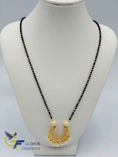 Cz stones with pearls pendant with a single line black diamond beads chain Handmade jewelry One gram gold jewelry Silver-plated jewelry Official Website globusfashions.com 🌸 S H O P . M O R E . S T Y L E S 🌸 https://www.etsy.com/shop/Globusfashions Necklaces - https://www.etsy.com/shop/Globusfashions?section_id=18712263 Bracelets - https://www.etsy.com/shop/Globusfashions?section_id=18969767 Pendant Sets - https://www.etsy.com/shop/Globusfashions?section_id=18707402 Tikka - https://www.etsy.co Gold Pearl Necklace With Black Round Beads, Black Pearl Chain Jewelry For Wedding, Black Wedding Jewelry With Gold Beads, Black Polished Beads Necklace For Wedding, Black Polished Bead Necklace For Wedding, Black Necklaces With Gold Beads For Wedding, Black Necklace With Gold Beads For Wedding, Black Pearl Chain Necklace For Wedding, Black Beaded Necklace For Wedding