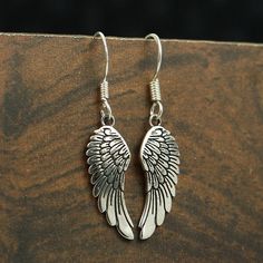 Silver Angel Wing Earring - Angel Wing Dangle Earring - 925 Sterling Silver Earring - Handmade Earring - Ear Wire Earring - Angel Wing Jewelry - Unique Silver Jewelry - Antique Silver Earring - Feather Earring - Gift For Her - Best Gift Jewelry. We accept customisation, contact us For Custom orders. Product Detail : Metal : 925 Sterling Silver Christmas Day Offer-Christmas Sale-Father's Day Gift-Mother's Day Gift-Christmas Gift-Wedding Jewelry-Birthstone Jewelry-Bridal Jewelry-Personalized Jewel Wing-shaped Earrings For Gift, Wing-shaped Pierced Earrings As Gift, Wing-shaped Pierced Earrings For Gift, Handmade Silver Wing-shaped Earrings, Silver Wing-shaped Earrings, Handmade Silver Earrings, Angel Wings Jewelry, Sterling Silver Earrings Handmade, Antique Silver Earrings