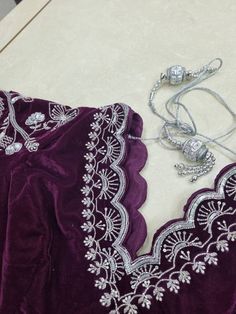 This package contains one piece saree blouse for women. This blouse is made in velvet fabric with heavy work of zari and sequins. Can be mix and match with saree or lehenga. Stitching  For stitched dresses you can chose from size chart or can message us for customization.our team will send you size chart for customization. Feel free to convo for any details to help you in your selection because customize dresses cannot be return or exchange. Note: color may slightly vary because of different scr Purple Velvet Blouse For Silk Saree, Luxury Purple Blouse Piece With Embroidered Border, Luxury Unstitched Purple Blouse Piece, Unstitched Purple Embroidered Blouse Piece, Purple Velvet Blouse, Lehenga Stitching, Blouse Crop Top, Designer Saree Blouse, Blouse Crop