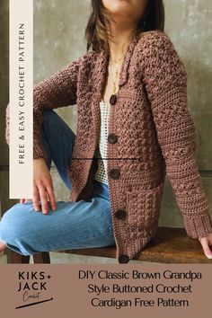 a woman sitting on top of a wooden bench wearing a brown crochet jacket