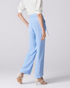 The Water Stone Pant features a large front patch pocket, creating masculine impression with its straight, clean silhouette. A belt sewn at the back creates a knot in the center front, adding some accent to the look. Tailored with the lightweight crepe fabric giving beautiful drapes. The center tuck at front enhances the neat impression. The pants are also functional coming with side pockets and can be worn as a set-up with the¬¨‚Ä†Lewitt Shirt. Blue Wide Leg Dress Pants For Summer, Blue High-waisted Dress Pants, Light Blue High Waist Workwear Pants, Blue Wide Leg Bottoms For Formal Occasions, Formal Blue Wide Leg Bottoms, Summer Blue Ankle-length Dress Pants, Blue Summer Dress Pants, Light Blue Formal Spring Bottoms, Blue Straight Dress Pants For Summer