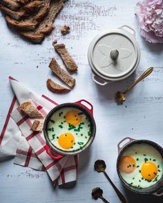 two eggs and toast are on the table