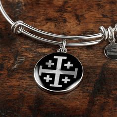 Do you love the Jerusalem cross? Purchase This Best-seller and We Guarantee It Will Exceed Your Highest Expectations! ➜ Our patent-pending jewelry is made of high quality surgical steel with an 18k gold finish option. ➜ Our jewelry is personalized in the U.S.A by awesome working moms just like yours! We hire and train working mothers and pay a living wage. We are proud to support strong communities and keep jobs in America! This Jewelry Item Is the Perfect Keepsake! Whether for Yourself or a Loved One. ➜ If the custom engraving option is available, engrave onto the back of the pendant your loved one's name, your wedding date, an anniversary, or anything else you want to remember and keep you close to her heart. Each personalized piece offers exceptional craftsmanship that is fit to be an i Engraved Adjustable Cross Pendant Jewelry, Adjustable Engraved Cross Pendant Jewelry, Symbolic Stainless Steel Cross Jewelry, Nickel-free Stainless Steel Cross Jewelry, Engraved Stainless Steel Cross Jewelry, Personalized Stainless Steel Cross Jewelry, Adjustable Sterling Silver Laser Engraved Jewelry, Adjustable Sterling Silver Jewelry Laser Engraved, Adjustable Laser Engraved Sterling Silver Jewelry