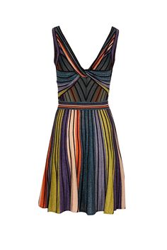 Experience the ultimate glam bombshell look with this Missoni dress. Made of metallic ribbed knit in blue, green, orange, black, and white, this dress features a striking color block design and a unique cross-back detail. Perfect for any special occasion, pair with metallic heels and a clutch bag. Size 2 (IT 38) 94% Polyamide, 6% Metallised Fiber Unlined Pullover Cross-back detail Ribbed knit Bust 28" Waist 23" Shoulder to hem 27.5" Spring Evening Knit Mini Dress, Evening Mini Knit Dress, Evening Knit Mini Dress, Knit Mini Length Evening Dress, Ribbed Knee-length Party Dress, Knee-length Ribbed Party Dress, Knee-length Knit Party Dress, Ribbed Knit Party Dress, Ribbed Knit Dresses For Party