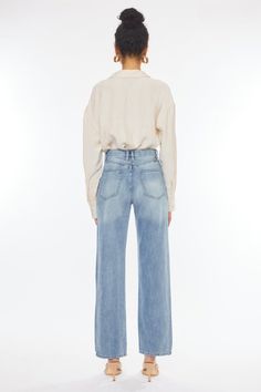 These jeans bring back the timeless charm of wide leg straight jeans with a modern twist. The light stone wash gives them a vintage-inspired look, while the rigid denim ensures authenticity. The slight cross-over front waistband adds a unique touch. With knee distress for a touch of edge and a zip fly for easy wear, these jeans offer both style and comfort for a versatile and trendy wardrobe addition. 100% Cotton High waistline Light stone wash Distress detailing Ankle length A US design by Kan Wide Legged Jeans, Oversized Knit Cardigan, Trendy Jeans, Straight Leg Denim, Jeans Online, China Fashion, Bring Back, Everyday Wardrobe, Sheer Fabrics