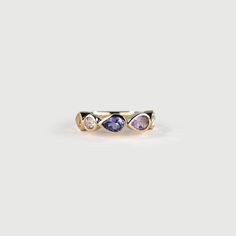 A colorful piece from the BLOOM collection. Inspired by the hues of a sunset, it captures the transition of colors as the day turns to night. The harmonious blend of these gemstones creates a mesmerizing gradient, reminiscent of the sky's ever-changing palette. The Sunset Bloom Ring is a wearable piece of art that celebrates the beauty and magic of nature's daily spectacle. Product Details * 14K solid gold  * 5 Natural Gemstones:  1 round  4 pear  Total carat weight: approximately 1.75 CT Color Modern Multicolored Multi-stone Gemstones, Pink Morganite, The Sunset, Purple Amethyst, Dream Wardrobe, Spectacles, Blue Topaz, Natural Gemstones, Hong Kong