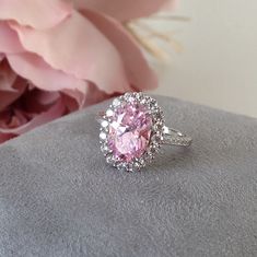 "Large Pink Topaz Sterling Silver cocktail Ring, Large Engagement Ring, Promise Ring, Evening Ring, mothers day gift, Gifts for Girlfriends, 💎 Gem Stone: Pink Topaz 💎 Gemstone Shape: Square 💎 Material: Sterling Silver with 18k white gold plating. 『 Other Precious metal bands are available in white gold, rose gold or yellow gold.』please contact us for custom orders. This exquisite designer ring is made with hand-selected 100% conflict free and environmental friendly natural topaz. The process Halo Open Ring With Center Stone For Gift, Gift Halo Open Ring With Center Stone, Dazzling Rings With Accent Stones As Gift, Round Topaz Ring With Halo Setting As Gift, Dazzling Rings With Accent Stones For Gift, Dazzling Rings With Accent Stones, Pink Halo Ring With Accent Stones For Anniversary, Pink Halo Design Ring For Anniversary, Gift Cluster Ring With Halo Setting In Cubic Zirconia