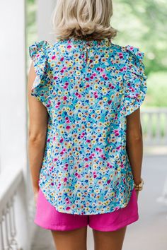 Be the talk of the town in our Better Believe It Aqua Blue Floral Blouse! Soft and lightweight, with charming ruffled sleeves, show off your style in this sweet, playful look. No one will be able to deny your chic, flowery 'fit. Trust us, it's an absolute must-have! Round neckline Button keyhole back Ruffled cap sleeves Ditsy floral print No stretch Payton is wearing the small. Ditsy Floral Blouse, Blue Floral Blouse, Talk Of The Town, Mint Julep Boutique, The Talk, Ruffled Sleeves, Model Fits, Ditsy Floral, Floral Blouse