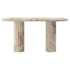 a white marble table with two columns