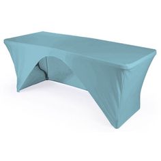 a blue table cloth on top of a white surface