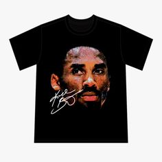 a black t - shirt with an image of a man's face