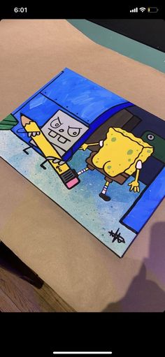 an image of a spongebob painting on a table