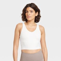 Women's Flex Light Support V-neck Crop Sports Bra - All In Motion™ : Target V-neck Activewear With Seamless Construction For Sports, Versatile Sports Bra For Light Impact Sports, V-neck Activewear With Seamless Construction, Seamless V-neck Activewear For Sports, White V-neck Athleisure Activewear, Solid Color V-neck Sporty Activewear, Athleisure V-neck Activewear With Light Support, Summer V-neck Sports Bra, V-neck Sports Bra In Solid Color For Athleisure