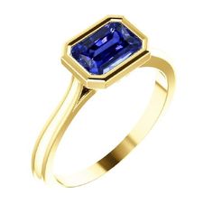 METAL SPECIFICATIONS Yellow Gold 14K STONE SPECIFICATIONS Stone Name : Blue Sapphire Stone Cut : Radiant Stone Details : There is one radiant cut sapphire approx. 1.50 carats (Approx. Size 7 x 6 mm). Natural earth mined stone. Quality of Sapphire : AAA Sapphire Treatment : Heated Total : Approx. 1.50 Carats RING SPECIFICATIONS Size : 6.5 (Can ship in any size, please send us a message about size after placing the order) Appraised Value : $3573.00 Comes with Certificate Blue Sapphire Stone, Emerald Blue, Solitaire Setting, Emerald Stone, Radiant Cut, Sapphire Stone, Natural Earth, Stone Cuts, Solitaire Ring