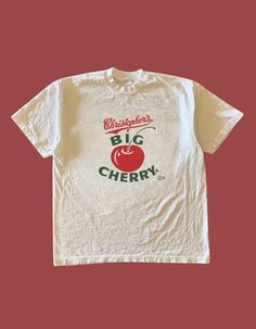 🍒 Elevate your wardrobe with our latest unisex graphic tee creation! Crafted from soft, breathable cotton, this tee is both casual chic.  🍒Pair it with your favourite denim shorts for a laid-back vibe, or dress it up with a skirt for a more polished look. 🍒 Sizing reference ~ The Graphic Tees are true to size and are not oversized, please refer to the size guide that is attached as a photo on each post. For an oversized look, choose a size up ️  🍒 Shipped from Australia for speedy delivery 90s Slogan Cotton T-shirt, Basic Summer Graphic T-shirt, Basic Summer T-shirt With Graphic Design, Summer Cotton T-shirt With Graphic Design, 90s Graphic Design T-shirt For Summer, 90s Style Graphic T-shirt For Summer, Summer Cotton T-shirt With Logo Print, Cotton T-shirt With Logo Print For Summer, 90s Cotton Graphic T-shirt