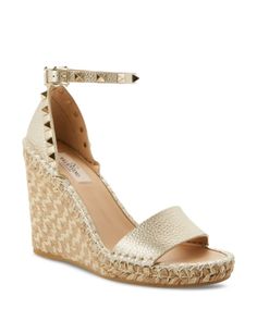 Valentino Garavani Women's Pyramid Studded Espadrille Wedge Heel Sandals Luxury Evening Wedge Sandals For Summer, Luxury Gold Wedge Sandals For Spring, Designer Gold Platform Sandals, Luxury Gold Platform Wedge Sandals, Elegant Gold Leather Wedge Sandals, Luxury Platform Wedge Sandals, Luxury Wedge Sandals For Summer, Gold Embellished Wedge Sandals For Beach, Luxury Formal Wedge Sandals