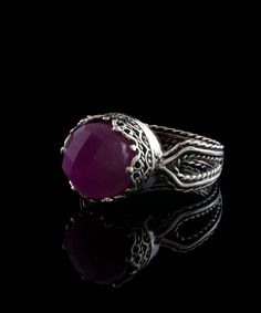 Looking for the perfect gift for your loved one? Look no further than this stunning silver filigree art women's cocktail ring. With its intricate details and beautiful face-up design, this ring is sure to make an impression. Featuring a double-side faceted checkerboard round-cut ruby corundum gemstone measuring 10 mm and 0.47" / 12.00 mm in face size, it looks absolutely gorgeous when worn. This exquisite piece comes complete with a velvet pouch, silver polish cloth, and a luxurious gift box, ma Luxury Silver Ruby Ring With Stone Setting, Ruby Filigree Ring As Gift, Gift Filigree Ring With Stone Setting, Handmade Elegant Ruby Ring Gift, Elegant Handmade Ruby Ring For Gift, Elegant Silver Carved Filigree Ring, Ruby Filigree Ring With Gemstone For Gift, Exquisite Filigree Ring With Gemstone For Gift, Silver Filigree Ring With Stone Setting For Gift