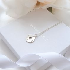 Silver Compass Necklace Be inspired by our dainty and meaningful compass necklace. Our silver compass necklace represents protection, love and a sense of home. This minimalist necklace comes with an inspirational description card and is packaged in a branded Bohemarie gift box, making this necklace the perfect gift for yourself or a special loved one. Necklace Details: * Compass Charm: 1.5 x 1.2cm * Chain Length: 40cm, 45cm or 50cm * Chain Style: Dainty Trace Chain * Material: 925 Sterling Silver * Skin Friendly: Hypoallergenic & Nickel-Free More From Us: * www.etsy.com/uk/shop/BohemarieJewellery Elegant Compass Design Necklaces As Gift, Elegant Necklace With Compass Design For Gift, Minimalist Compass Design Jewelry As Gift, Anniversary Sterling Silver Compass Necklace, Dainty Jewelry With Compass Design For Gifts, Elegant Compass Design Jewelry Gift, Minimalist Compass Design Necklace As Gift, Compass Design Pendant Necklace As Gift, Compass Design Pendant Charm Necklace As Gift