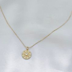 Versatile pendant necklace with center cubic zirconia stone. Perfect to wear alone or layer with other necklaces. 14k Gold Filled Chain 14k Gold Filled Charm Charm: 20.9mm x 14.8mm Chain length: 17.5" with 2.5" extender Lobster clasp closure Hypoallergenic Water resistant & tarnish free Nickel & lead free Cubic Zirconia Necklace With Pearl Pendant, Tarnish Resistant Cubic Zirconia Diamond Pendant Necklace, Tarnish Resistant Cubic Zirconia Pendant Necklace, Fine Jewelry Necklaces In Cubic Zirconia, Tarnish Resistant, Gold Solitaire Necklace With Clavicle Chain And Round Pendant, Fine Jewelry Cubic Zirconia Necklace Tarnish Resistant, Gold Cubic Zirconia Medallion Necklace, Gold Plated Medallion Necklace With Pearl Pendant, Tarnish Resistant Round Cubic Zirconia Charm Necklaces