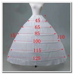 a white wedding dress on a mannequin with measurements for the bust and skirt