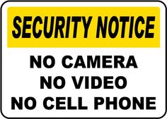 a yellow and black security notice sign with the words no camera, no cell phone