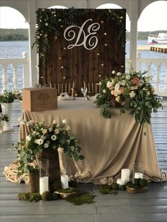 the table is set up with candles and flowers