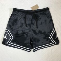 Nike Jordan Sportswear Club Diamond Shorts Men’s SZ XXL Dark Shadow DZ0561-022 NWT Elevate your activewear game with these Nike Jordan Sportswear Club Diamond Shorts. Designed with comfort and style in mind, these shorts feature an elastic waistband and drawcord closure, as well as side pockets for safe and secure storage. The moisture-wicking and Dri-Fit Technology ensure you stay cool and dry during your training and athletic activities. The tie-dye print in Dark Shadow/Black/White adds a unique touch to these athletic shorts, which are perfect for gym and training, walking, school, volleyball, cross-training, CrossFit, athleisure, basketball, running, and jogging. The Nike Jordan Sport Dri-FIT Breakfast Club AOP Diamond Shorts are machine washable and made of 100% polyester, making them Jordan Diamond Shorts, Basketball Shorts, Active Wear Shorts, Cross Training, Tie Dye Print, Nike Jordan, Athletic Shorts, Nike Air Jordan, Dri Fit