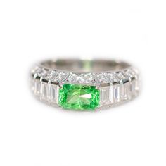 *Condition: Brand new *Center Stone: Natural Sri Lanka Tsavorite, Cushion-cut, approx 1.27ct *Side stones: Natural white diamond, round-cut (VS1 clarity and F color) *White Sapphire Baguette Cut *Metal Purity: Can be select Each piece is made-to-order with care and special attention to detail. all items are made with conflict-free diamonds and gems. Size: made to order The item will be gift wrapped and shipped. ------------------------------------------------------------------- Available in : 14 Luxury Green Sapphire Ring For Anniversary, Luxury Green Sapphire Anniversary Ring, Platinum Green Diamond Ring, Luxury Tsavorite Emerald Ring For Anniversary, Luxury Tsavorite Rings For Anniversary, Green Platinum Ring For May Birthstone, Green Platinum Ring For Gift, Green Platinum Rings As Gifts, Green Platinum Rings For Gifts