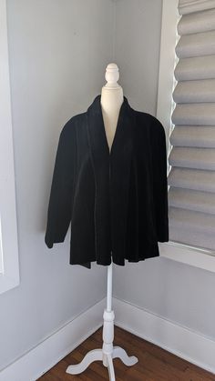 "Black cotton velvet cape style women's coat. Open, loose style with polyester satin lining, built-in shoulder pads, side pockets. Heavy weight fabric suitable for cold weather. From I. Magnin high end, luxury brand department store. It has been dry cleaned and is in excellent condition. One size fits most. Approximately 19\" across shoulders, 21\" sleeves, 26\" length." Velvet Cape, Cape Style, Style Coat, Vintage Blazer, Loose Style, Polyester Satin, Red Wool, Cotton Velvet, Women's Coat