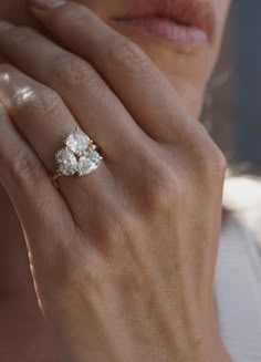 a close up of a person wearing a ring