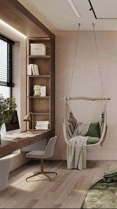 a hammock chair hanging from the ceiling in a room with wood flooring