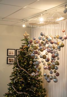 a christmas tree with ornaments hanging from it