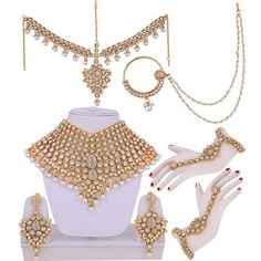 an assortment of jewelry on display with white gloves and red nail polish varnishs