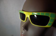 1970s Vintage Mod Sunglasses Yellow Green Frame Made in Italy Funky, vintage sunglasses. Bright yellow frames with green squares. Cool, Mod look. Squared ends. Dark lenses. Retro Green Plastic Sunglasses, Retro Green Sunglasses For Parties, Retro Green Sunglasses For Party, Retro Yellow Sunglasses For Spring, Retro Yellow Sunglasses With Mirrored Lenses, Retro Yellow Plastic Sunglasses, Retro Yellow Sunglasses With Uv Protection, Yellow Retro Plastic Sunglasses, Vintage Rectangular Sunglasses For Spring