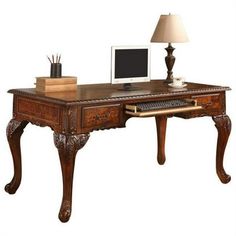 Please Note: Accessories not includedCreate a stylish and royal work environment with this special cherry walnut 60 Inch Executive Desk. The desk special features a masculine look with 2 drawers and a pull out center drawer for your keyboard. This durable executive desk is made of burl wood, veneered and has a 2 tone of cherry and walnut. The rectangular shape will provide you with ample space for your computer and to spread out your work in front of your monitor. The legs are curved with hand carved panels around the desk.Dimension: 60"L x 33"D x 33"HColor: Two Tone Cherry w/ WalnutMaterial: Burl Wood, Veneered Color: Multicolor. Victorian Desk, Wood Office Desk, Desk Dimensions, Wood Office, Traditional Office, Wood Room, Durable Furniture, Antique Desk, Desk And Chair Set